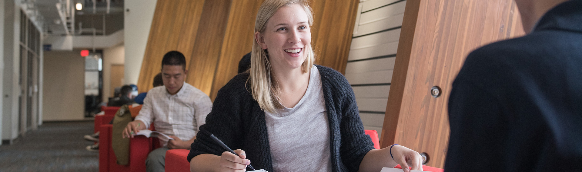 Student taking notes